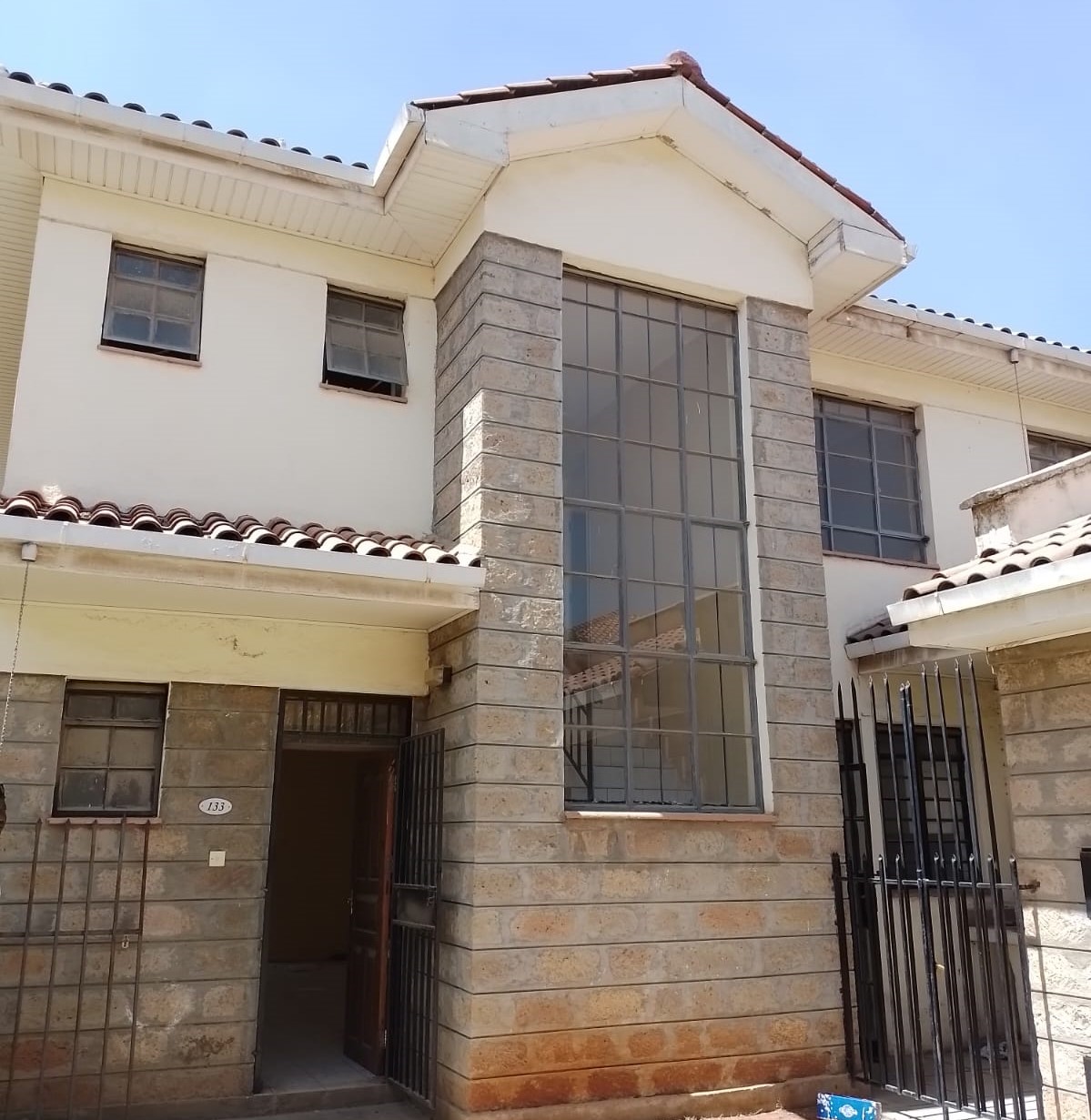 The property is situated in a secure gated community with easy access to major social amenities. It is located close to Signature Mall, Total petrol station, St. Bhakita School and numerous other nearby shopping centers. Accommodation details entail: entry porch; spacious living room; dining area; kitchen fitted with single drain sink unit, granite worktop, below and overhead cabinets, pantry; detached DSQ ensuite; cloakroom; 2 No. bedrooms fitted with built-in wardrobes; master bedroom ensuite; etc. The property also has a private garden, roads within the development are cabbro paved, borehole water supply and alternative power supply. Get in touch for viewing and or booking.             
Additional features include smooth and easy access to the Mlolongo Expressway toll station.